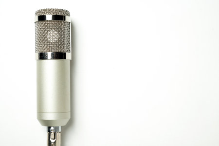 Studio microphone for podcasting or streaming with a white background. Copy space. Top viewの写真素材