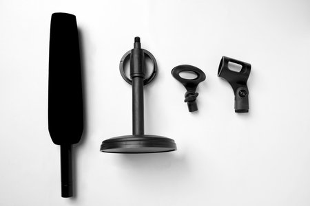 Studio microphone for podcasting or streaming with a set of mic stands on a white background. Top viewの写真素材