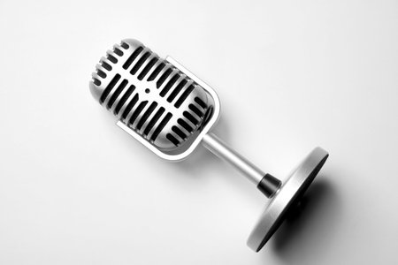 Vintage silver microphone with a white background. Top viewの写真素材