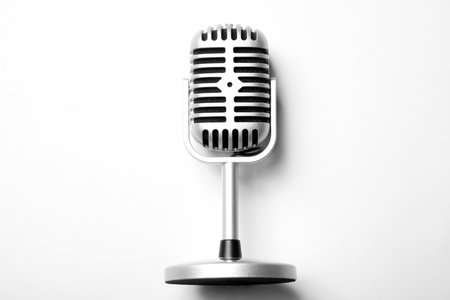 Vintage silver microphone with a white background. Top viewの写真素材