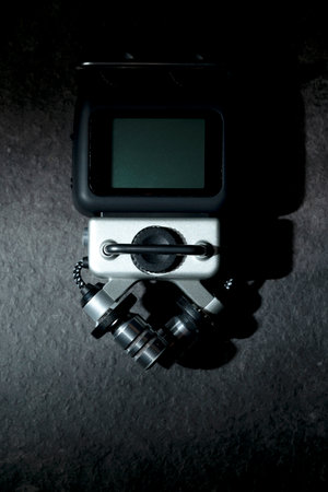 Handy recorder device on a black background. Top viewの写真素材