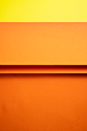 Orange folded paper texture abstract background. Folded paper surface. Copy spaceの写真素材