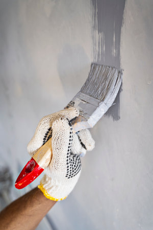 Indonesian southeast asian muslim woman in a sporty outfit practices yoga on a fitness mat in a public park outdoors. Concept of a Healthy active lifestyleの写真素材
