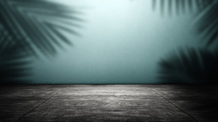 Interior of a modern and minimalist studio with the shadow of a palm leaf on a blue wall with a dark floor background. Mockup or copy spaceの写真素材