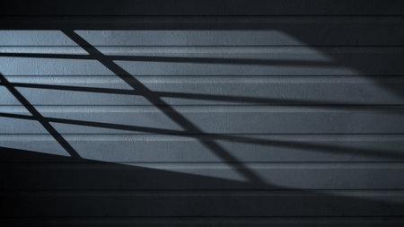 Dramatic shadow of window light casting on the striped wall texture. Copy space. Textured backgroundの写真素材