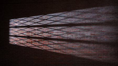 Dramatic shadow of window light casting on the brick wall texture. Copy space. Textured backgroundの写真素材