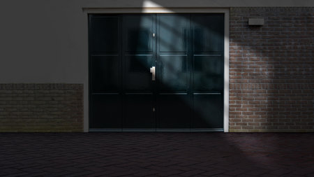 Dramatic shadow of window light shines across the interior of the room with door and brick walls with a tile floor. Mockup, copy space, or template. Empty backdrop podium for product or text displayの写真素材
