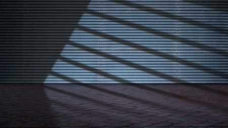 Dramatic shadow of window light shines across the interior of the room with metal walls and a brick floor. Mockup, copy space, or template. Empty backdrop podium for product or text displayの写真素材