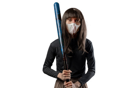 Indonesian southeast asian transgender man dressed as a woman wearing a bloody face mask and holding a baseball bat isolated over a white background. Concept of Halloween, Sister Hong, or red uncleの写真素材