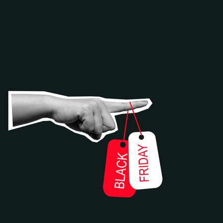 Human hand showing labels with Black Friday text on a colored background. Collage art of Black Friday Saleの写真素材
