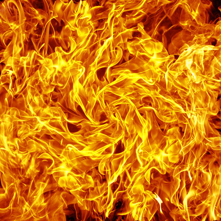 Dramatic red, orange, yellow flame and smoke rising against a dark background. Realistic, abstract...