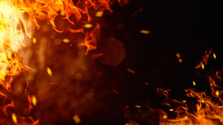 Dramatic red, orange, yellow flame and smoke rising against a dark background. Realistic, abstract fire burning background texture overlay. Vivid and hot blazing fire wallpaperの写真素材
