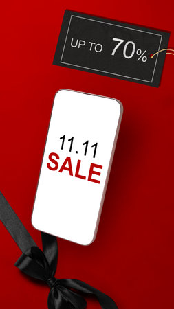 11.11 sale text on cellphone screen with up to 70% text on the label tag. Copy space. Flash sale conceptの写真素材