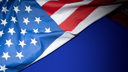 Green alarm clock with lime rectangular blocks on colored background. Empty area for copy space. Concept of time, reminder, or deadlineの写真素材