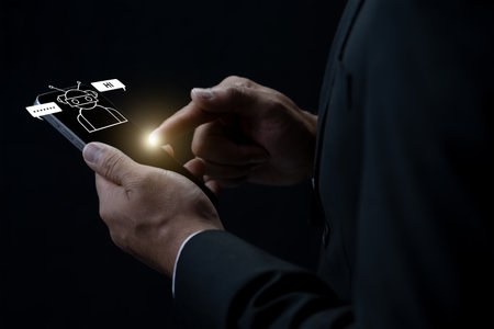 Businessman using a smartphone with a floating AI chatbot icon. Concept of digital customer service, artificial intelligence, virtual assistants, and automated technology in businessの写真素材
