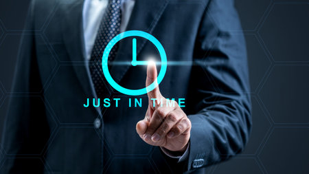 A businessman interacts with a glowing cyan clock interface featuring the words Just In Time,...