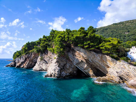 Adriatic coast in Petrovac, Montenegro. Petrovac is a resort town of the Budva Riviera, located in a horseshoe-shaped bay with a sandy beach. It is a quiet resort for a relaxing beach holidayの写真素材