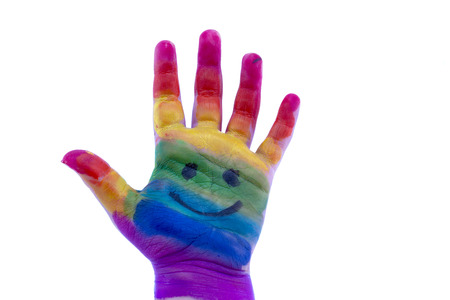 Child's hand painted watercolor on white background. Painted  rainbowの写真素材