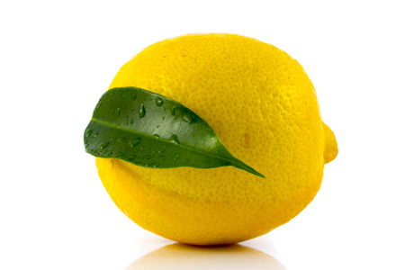 Single ripe lemon with green leaf isolated on white backgroundの写真素材
