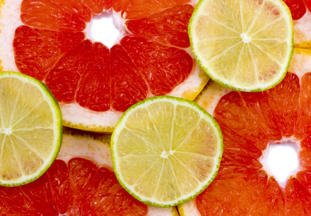 Mixed citrus fruit. Lime and grapefruit as backgroundの写真素材