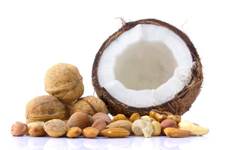 Set of coconut, walnuts, almonds, hazelnuts, cashews isolated on white backgroundの写真素材