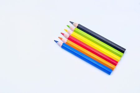 Group of vibrantly colored pencils arranging in a gradient, illustrating creativity, education, and art suppliesの写真素材