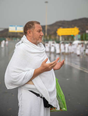 Muslim pilgrims praying on jabal Arafat, HajjHajj pilgrim prayingMuslim man wearing hajj cloth, Mecca, Saudi Arabia, August 10, 2019のeditorial素材