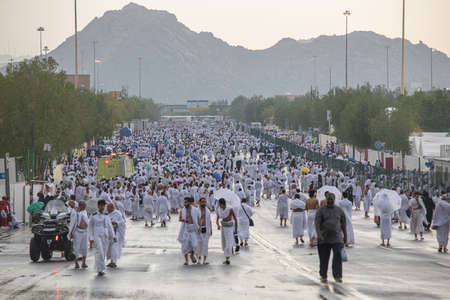 Hajj Pilgrims Performing Hajj, Rainy day, Arafat, Makkah, Saudi Arabia, August 2019のeditorial素材