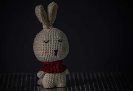 a woven bunny soft toy