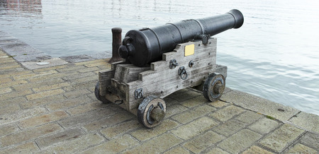 old medieval  cannon in la spezia harbourの写真素材