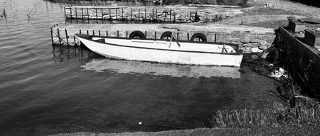 boat in traimeno lake in umbria regionの写真素材
