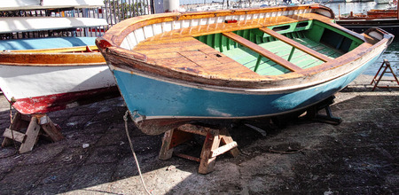 old wooden boat in the harbour of naplesのeditorial素材