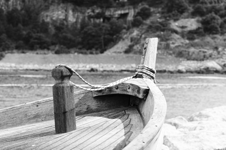 blue fishing boat in the harbour of portovenereの写真素材