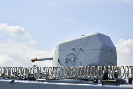 detail of military cannon on top a military shipの写真素材