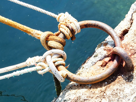 detail of a old marine rope in a harbourの写真素材