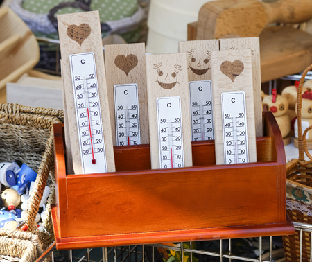 detail of plenty Thermometers at market