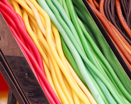 Colored candies; Wine gum in close up; Sweets at funfair; Colorful sweets in cored; Candy industry