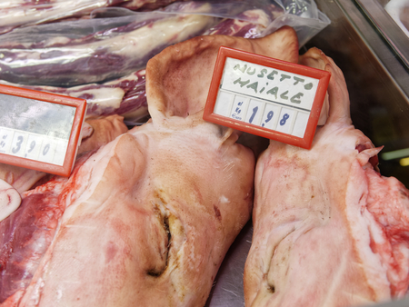 detail of porks head at market in italyの写真素材