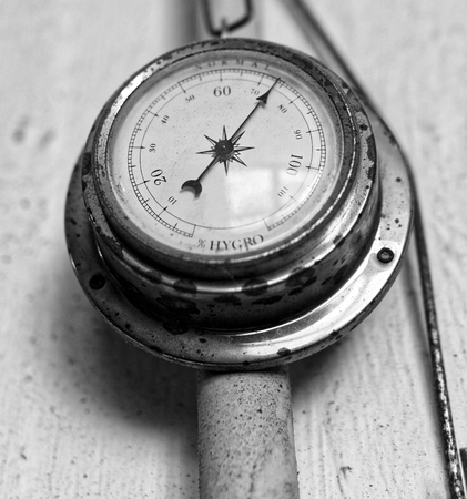 Analog device used to measure humidity on a wallの写真素材