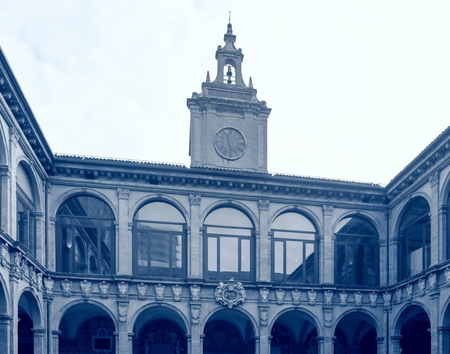 tower and courtyard of Archiginnasio palace - the first official headquarters for the University of Bologna,italyのeditorial素材