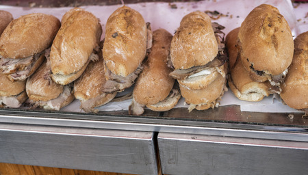 tasty sandwiches with pork for sale at the bar