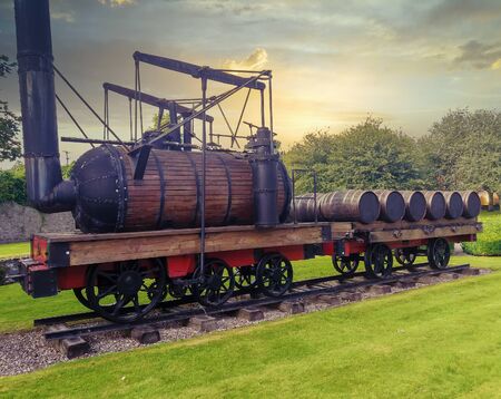 detail of old steam train loading wooden barrel for whisky