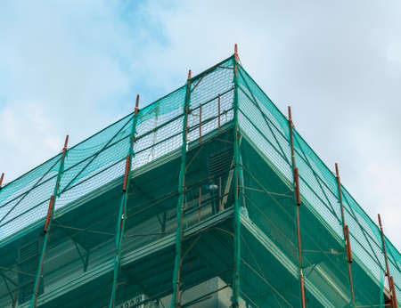green scaffolding in the town of salerno