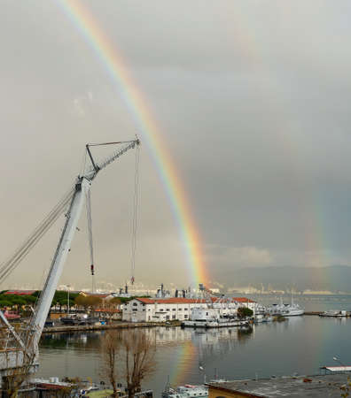 beautiful rainbow on la spezia gulfの写真素材