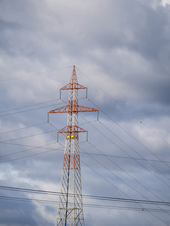 big electric tower in a meadow in La Speziaの写真素材