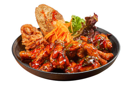 Spicy Buffalo Wings With Bread and Fried Onions  Isolated Sideの写真素材