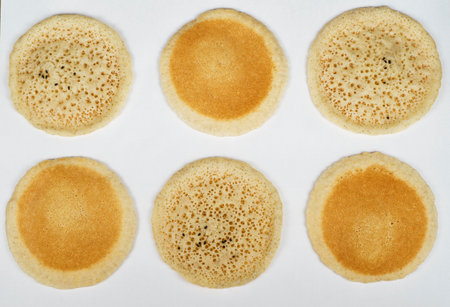 Qatayef bread, Traditional Arabic Ramadan Sweets on white background isolated.Top viewの写真素材