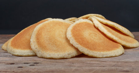 Qatayef bread, Traditional Arabic Ramadan Sweets,Pancakes on wooden table, close-up,の写真素材