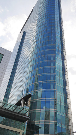 Blue skyscraper facade. office buildings. Modern glass silhouettes of skyscrapersのeditorial素材