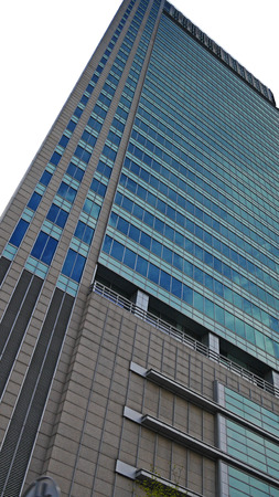 Blue skyscraper facade. office buildings. Modern glass silhouettes of skyscrapersのeditorial素材